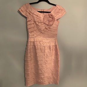 Pink shimmery ruffles dress.